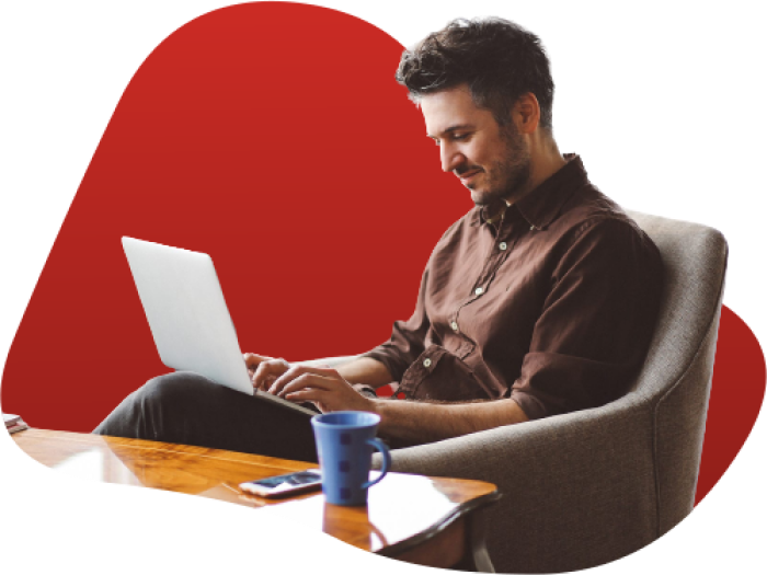 Man in chair on laptop